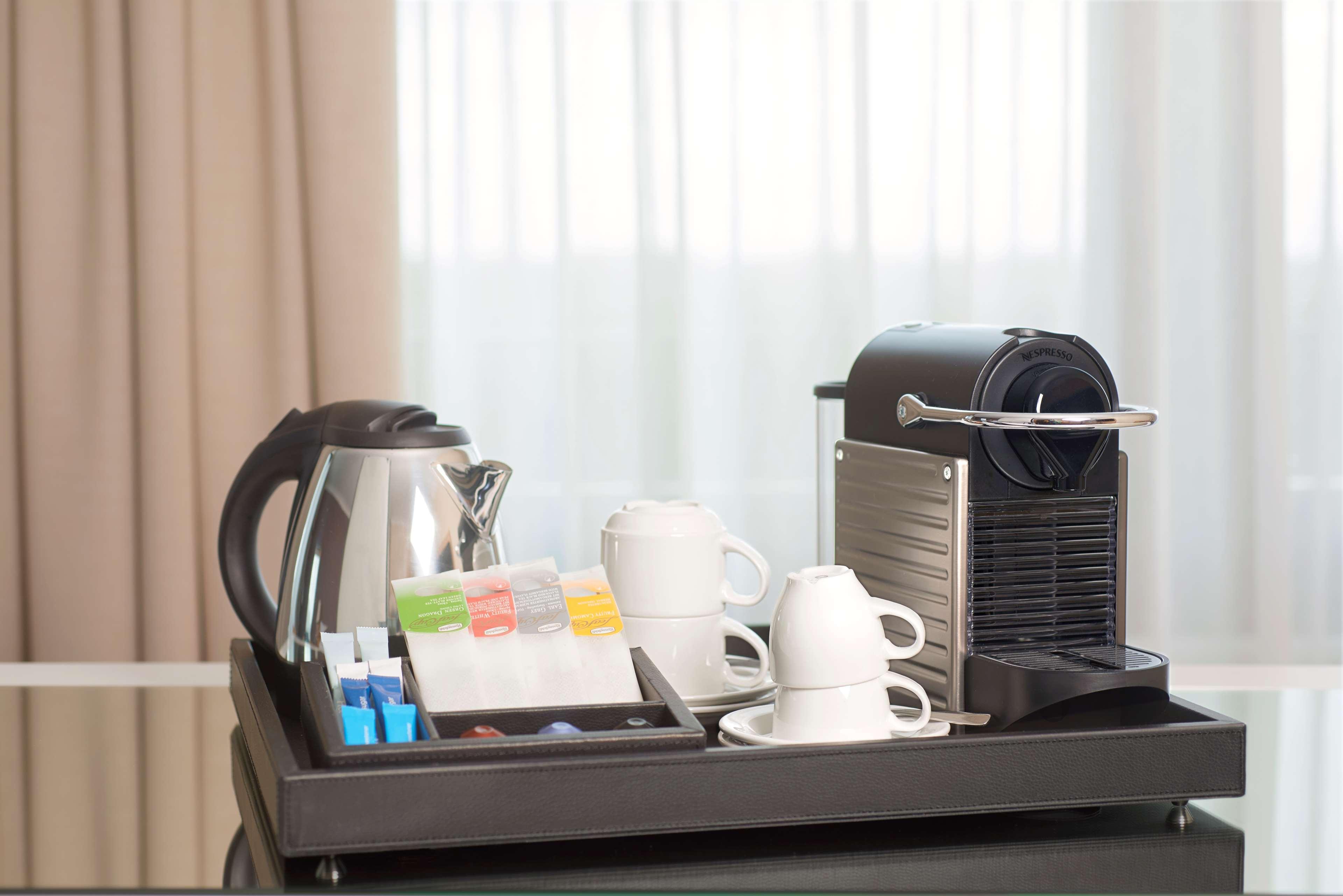Nh Collection A Coruna Finisterre Exterior photo A Nespresso coffee machine in a hotel room